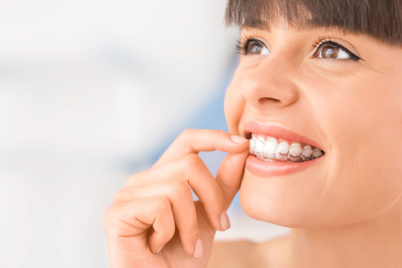 Orthodontist discussing clear aligner treatment with patient in Allen TX