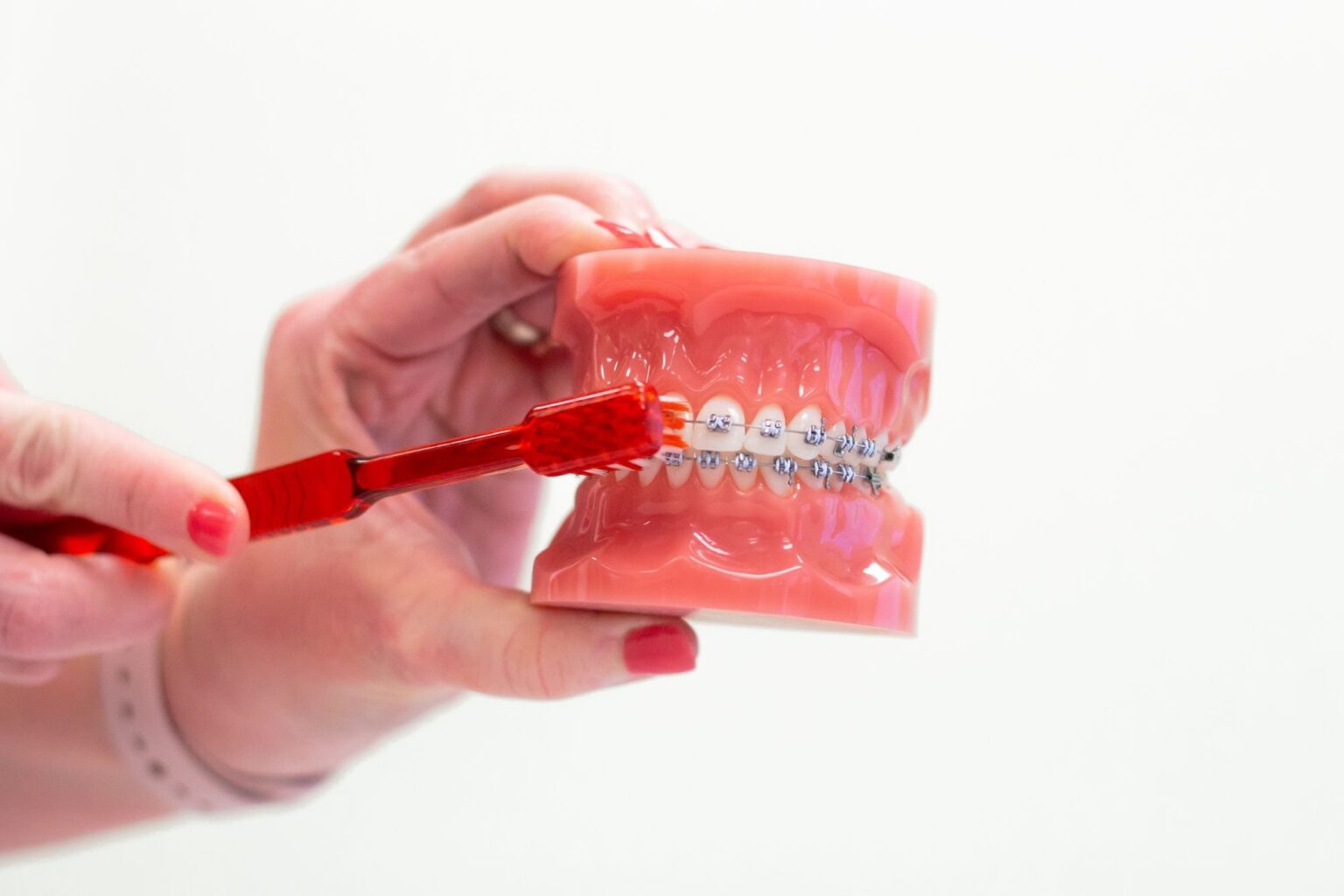 Patient meeting with orthodontist about braces treatment at Allen TX orthodontics office